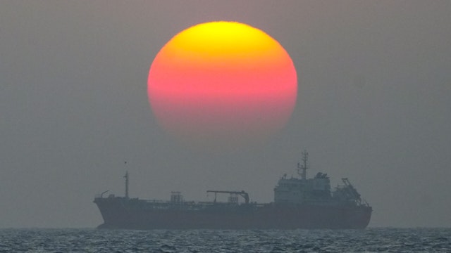 An oil tanker is moving on the sea at sunset in Colombo, Sri Lanka, on January 25, 2024.