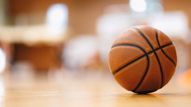 Close-up image of basketball ball over floor in the gym. (matimix via Getty Images)
