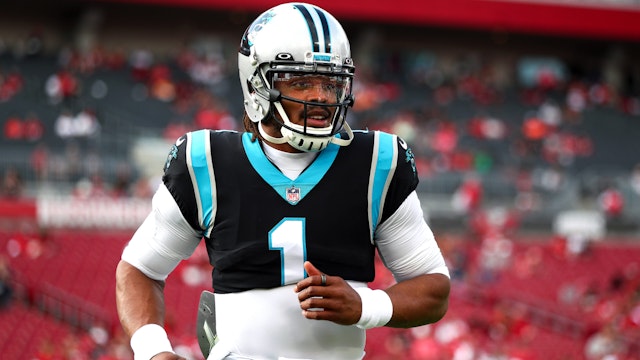 TAMPA, FL - JANUARY 9: Cam Newton #1 of the Carolina Panthers warms up prior to an NFL game against the Tampa Bay Buccaneers at Raymond James Stadium on January 9, 2022 in Tampa, Florida.