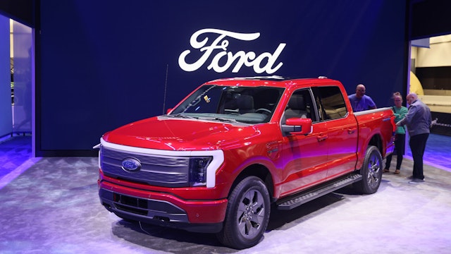 LOS ANGELES, CALIFORNIA - NOVEMBER 24: The Ford F-150 Lightning is displayed during the 2023 Los Angeles Auto Show at the Los Angeles Convention Center on November 24, 2023 in Los Angeles, California. This year’s edition of the Los Angeles Auto Show includes a range of new SUV models.