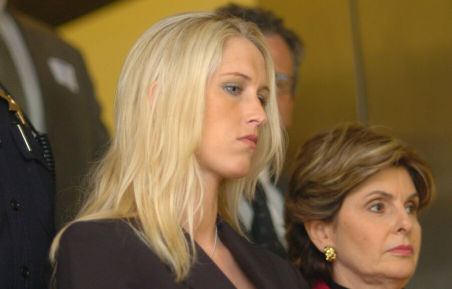 Amber Frey exits the courthouse with her attorney Gloria Allred after a day of testifying during the Scott Peterson double murder trial Tuesday, Aug. 10, 2004, at the San Mateo County Superior Courthouse in Redwood City. Scott Peterson is on trial for the murder of his wife Laci Peterson and their unborn child. (San Mateo County Times photo/Ron Lewis) (Digital First Media Group/San Mateo County Times via Getty Images)