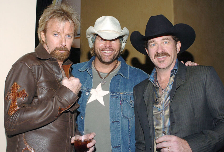 Toby Keith (center) and Brooks and Dunn during Clive Davis Hosts A Celebration of The American Music Awards at The Esquire House - Inside at Esquire House in Beverly Hills, California, United States. (Photo by L. Cohen/WireImage for J Records)
