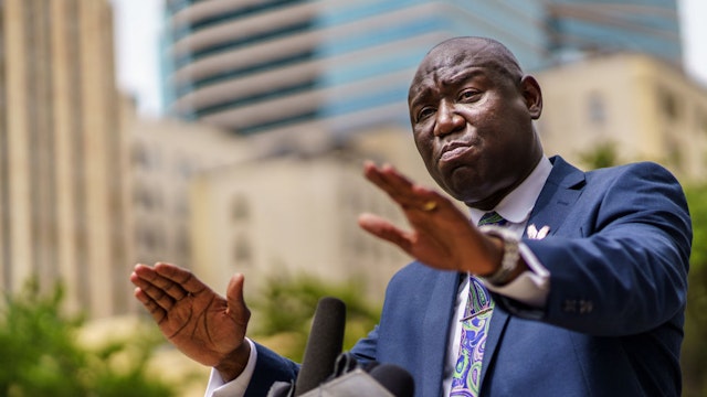 Attorney Ben Crump speaks at a press conference outside the federal courthouse on July 15, 2020, in Minneapolis, Minnesota. - Crump announced he is filing a civil lawsuit against the city of Minneapolis and police officers, on behalf of the family of George Floyd. (Photo by Kerem Yucel / AFP) (Photo by KEREM YUCEL/AFP via Getty Images)