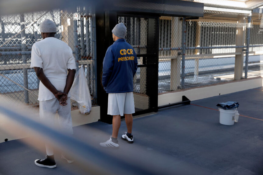 Condemned prisoner Scott Peterson, (right) with a fellow inmate is seen in the exercise area of during a tour of North Segregation of death row at San Quentin State Prison on Tuesday December 29, 2015, in San Quentin, Calif. Peterson was guilty of the murder of his wife Laci Peterson back in 2002. (Photo by Michael Macor/San Francisco Chronicle via Getty Images)