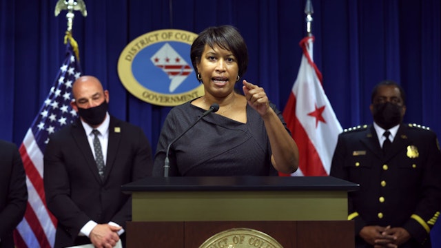WASHINGTON, DC - FEBRUARY 28: Washington DC Mayor Muriel Bowser (C) speaks during a press conference on February 28, 2022 in Washington, DC. Washington DC Mayor Muriel Bowser was joined by local and federal law enforcement officials to discuss security measures that are being implemented in the District ahead of U.S. President Joe Biden's State of the Union address and a potential protest by truckers against mask mandates.