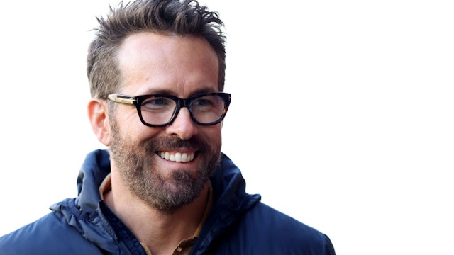 WREXHAM, WALES - APRIL 10: Ryan Reynolds, Owner of Wrexham smiles prior to the Vanarama National League match between Wrexham and Notts County at The Racecourse on April 10, 2023 in Wrexham, Wales. (Photo by Jan Kruger/Getty Images)