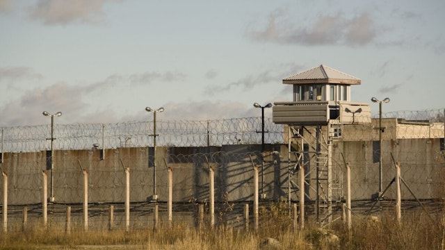 Prison wall and guard tower.