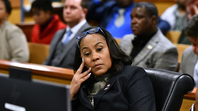 ATLANTA, GEORGIA - NOVEMBER 21: Fulton County District Attorney Fani Willis appears before Judge Scott McAfee for a hearing in the 2020 Georgia election interference case at the Fulton County Courthouse on November 21, 2023 in Atlanta, Georgia. Judge McAfee heard arguments as to whether co-defendant Harrison Floyd should be sent to jail for social media posts and comments that potentially targeted witnesses in the trial. McAfee declined to revoke Floyd's bond. Floyd was charged along with former US President Donald Trump and 17 others in an indictment that accuses them of illegally conspiring to subvert the will of Georgia voters in the 2020 presidential election.
