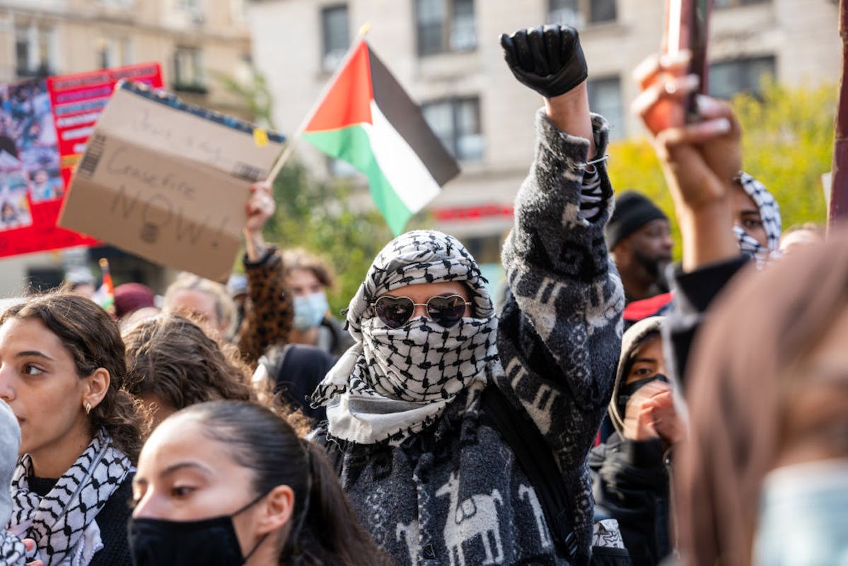 NextImg:Wearing Masks At Protests Abdicates Responsibility. And That’s The Point 