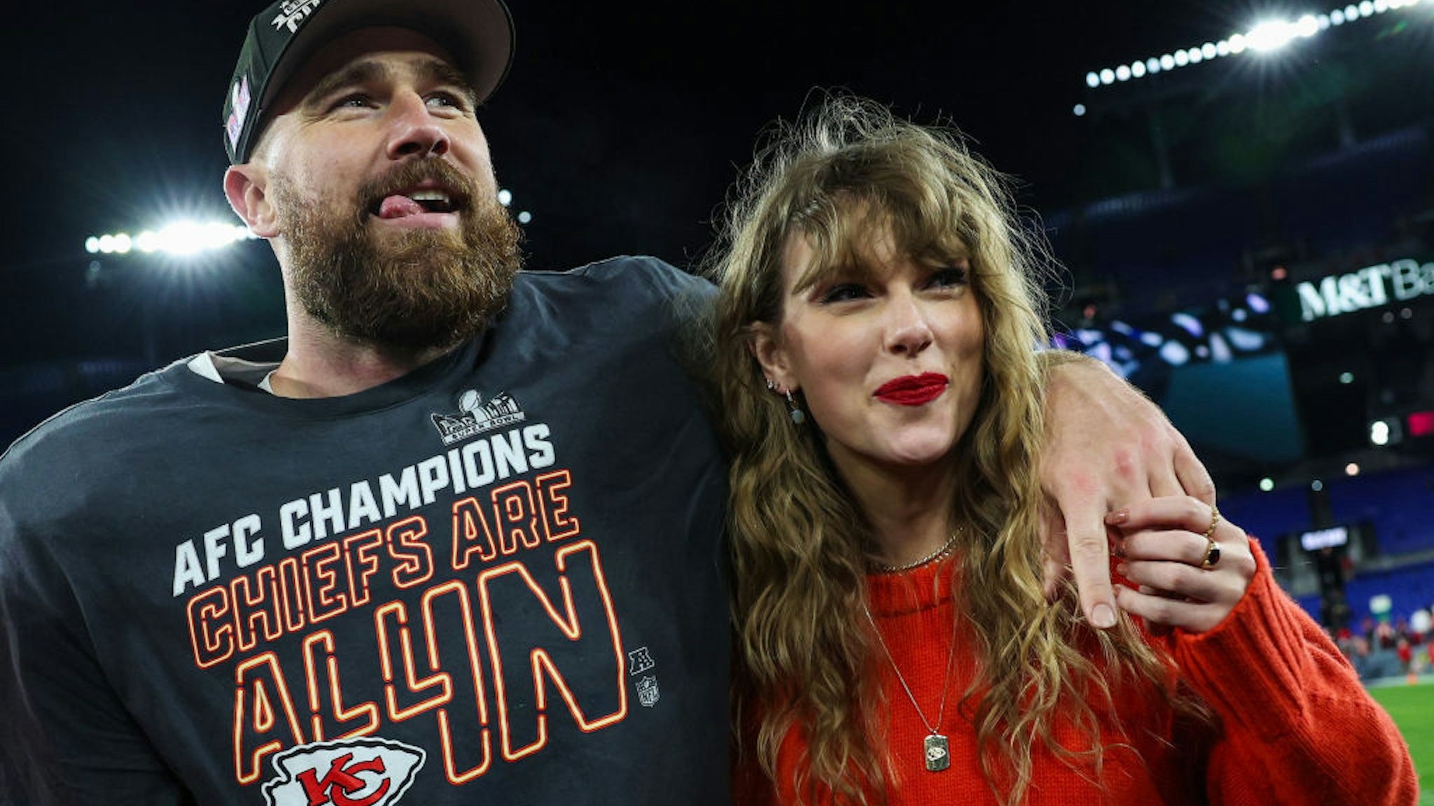 BALTIMORE, MARYLAND - JANUARY 28: Travis Kelce #87 of the Kansas City Chiefs (L) celebrates with Taylor Swift after defeating the Baltimore Ravens in the AFC Championship Game at M&amp;T Bank Stadium on January 28, 2024 in Baltimore, Maryland. (Photo by Patrick Smith/Getty Images)