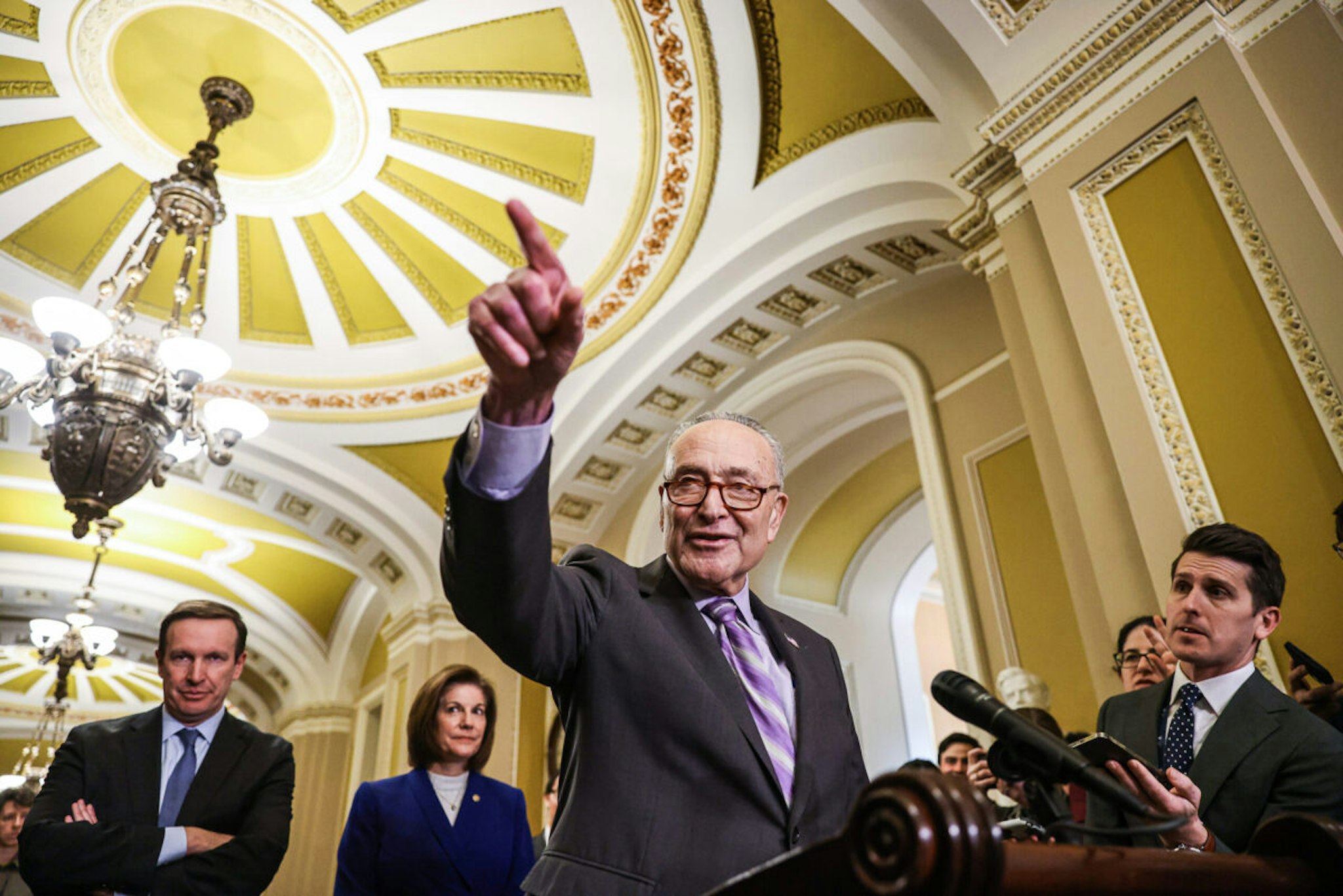 Senate Majority Leader Chuck Schumer, a Democrat from New York, center, during a news conference following the weekly Democratic caucus luncheon at the US Capitol in Washington, DC, US, on Tuesday, Feb. 6, 2024.