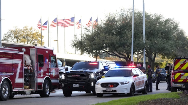 HOUSTON, TEXAS - FEBRUARY 11: Houston Police and Harris County Sheriffs officers outside of Lakewood Church on Sunday, Feb. 11, 2024, in Houston, after a reported shooting during a Spanish church service.