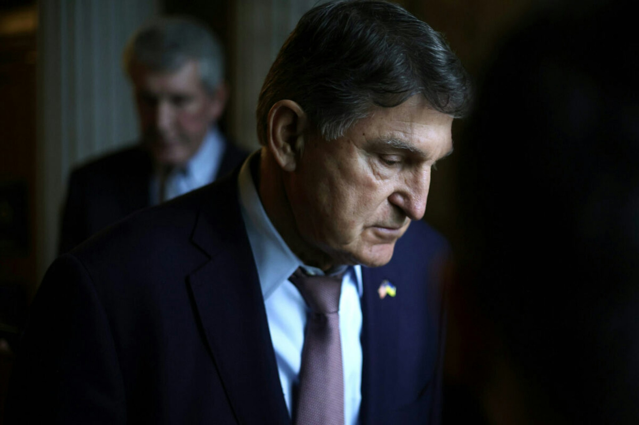 U.S. Sen. Joe Manchin (D-WV) leaves the Senate chamber after a live quorum call at the U.S. Capitol on February 12, 2024 in Washington, DC.