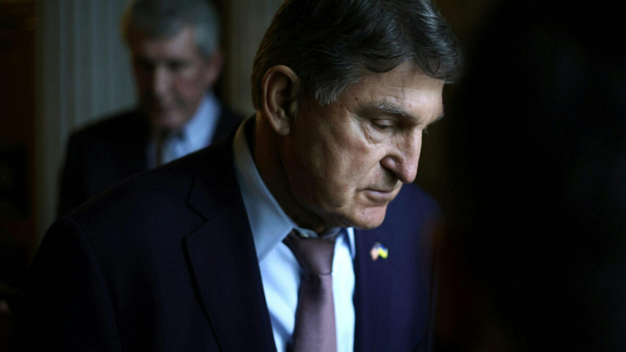 U.S. Sen. Joe Manchin (D-WV) leaves the Senate chamber after a live quorum call at the U.S. Capitol on February 12, 2024 in Washington, DC.