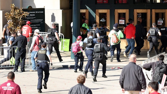 KANSAS CITY, MISSOURI - FEBRUARY 14: Law enforcement responds to a shooting at Union Station during the Kansas City Chiefs Super Bowl LVIII victory parade on February 14, 2024 in Kansas City, Missouri. Several people were shot and two people were detained after a rally celebrating the Chiefs Super Bowl victory.