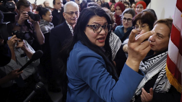 Rep. Rashida Tlaib (D-MI) greets demonstrators with Code Pink for Peace outside her office in the Rayburn House Office Building as they rallied on Capitol Hill in support of Palestinians and to demand a cease fire in Gaza on February 15, 2024 in Washington, DC.