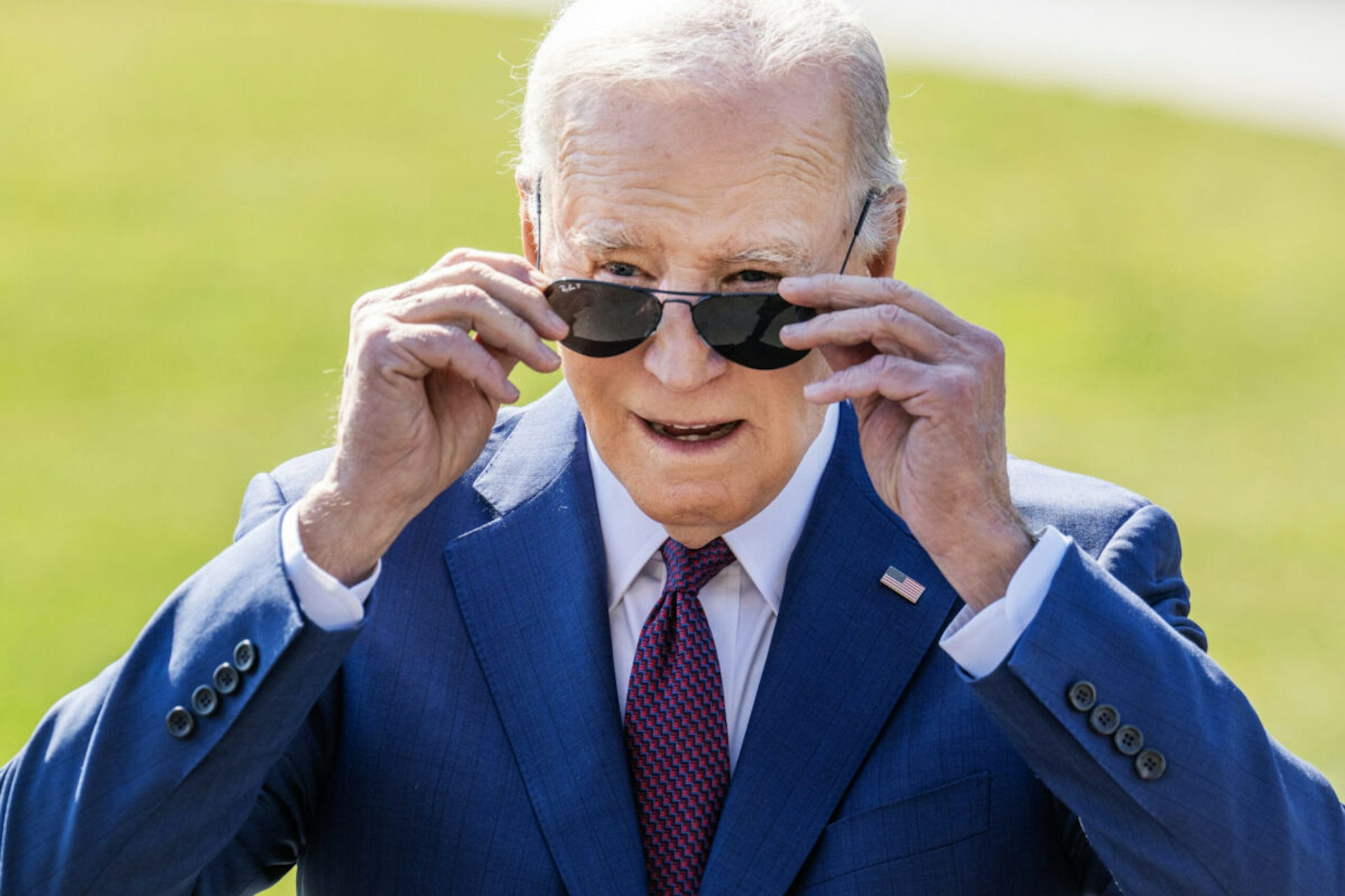 President Joe Biden addresses reporters on the South Lawn of the White House before boarding Marine One for a trip to Los Angeles for a campaign reception on Tuesday, February 20, 2024.