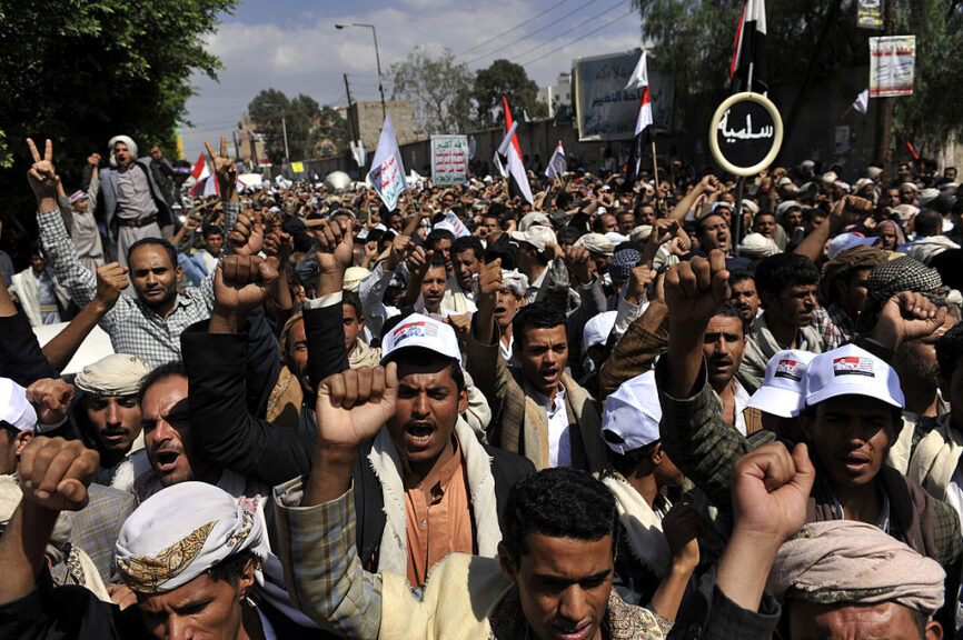 SANAA, YEMEN - SEPTEMBER 1: Supporters of Yemen's Shiite Houthi group stage anti government protest at Taghyeer square in capital Sanaa, Yemen on September 1, 2014. Shiite Houthi group blocked several main roads across the Yemeni capital Sanaa on Monday in response to a call by their leader Abdul-Malik al-Houthi to escalate action against the government of Prime Minister Mohamed Basindawa. (Photo by Mohammed Hamoud/Anadolu Agency/Getty Images)