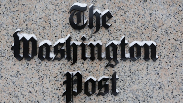 WASHINGTON, DC - JANUARY 23: Washington Post logo outside of the building covered with snow.