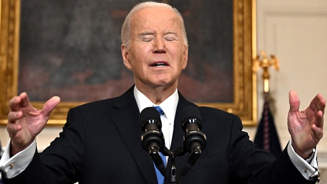 TOPSHOT - US President Joe Biden speaks about the Senate passage of war aid for Ukraine in the State Dining Room of the White House in Washington, DC, on February 13, 2024. Hours after the Senate finally approved security funding for democratic, pro-Western Ukraine -- as well as for the top US strategic priorities of Israel and Taiwan -- Biden challenged the House of Representatives to "move on this with urgency."