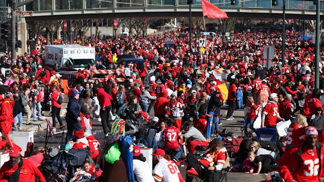 People take cover during a shooting at Union Station during the Kansas City Chiefs Super Bowl LVIII victory parade on February 14, 2024 in Kansas City, Missouri. Several people were shot and two people were detained after a rally celebrating the Chiefs Super Bowl victory.