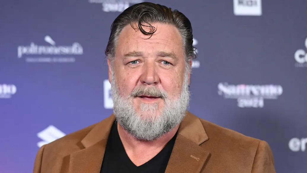 Russell Crowe Says He Fractured Both Legs On ‘Robin Hood’ Set But ‘Never Took A Day Off’