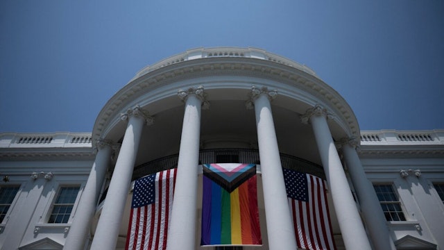 TOPSHOT - A Pride flag is displayed during a Pride celebration on the South Lawn of the White House in Washington, DC, on June 10, 2023.