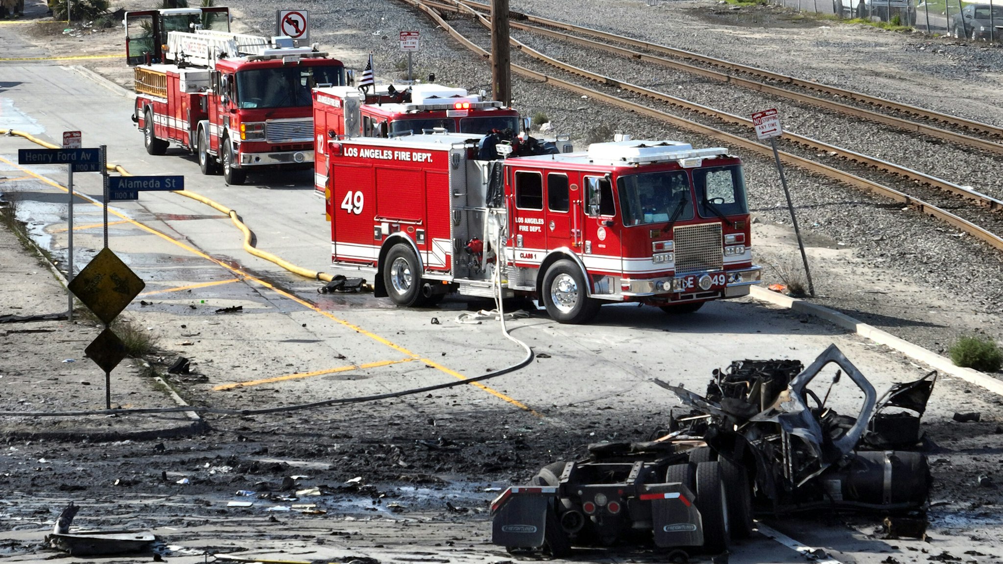 Wilmington, CA - February 15: Aerial view of truck explosion where several firefighters were injured, at least two critically, in an explosion involving a truck with pressurized cylinders in Wilmington Thursday, Feb. 15, 2024. Firefighters were sent to the 1100 block of North Alameda Street shortly before 7 a.m., according to Nicholas Prange of the Los Angeles Fire Department. ``Several other injured are being evaluated on scene, awaiting additional ambulances to arrive -- (an) estimated seven total firefighters,'' Prange said.