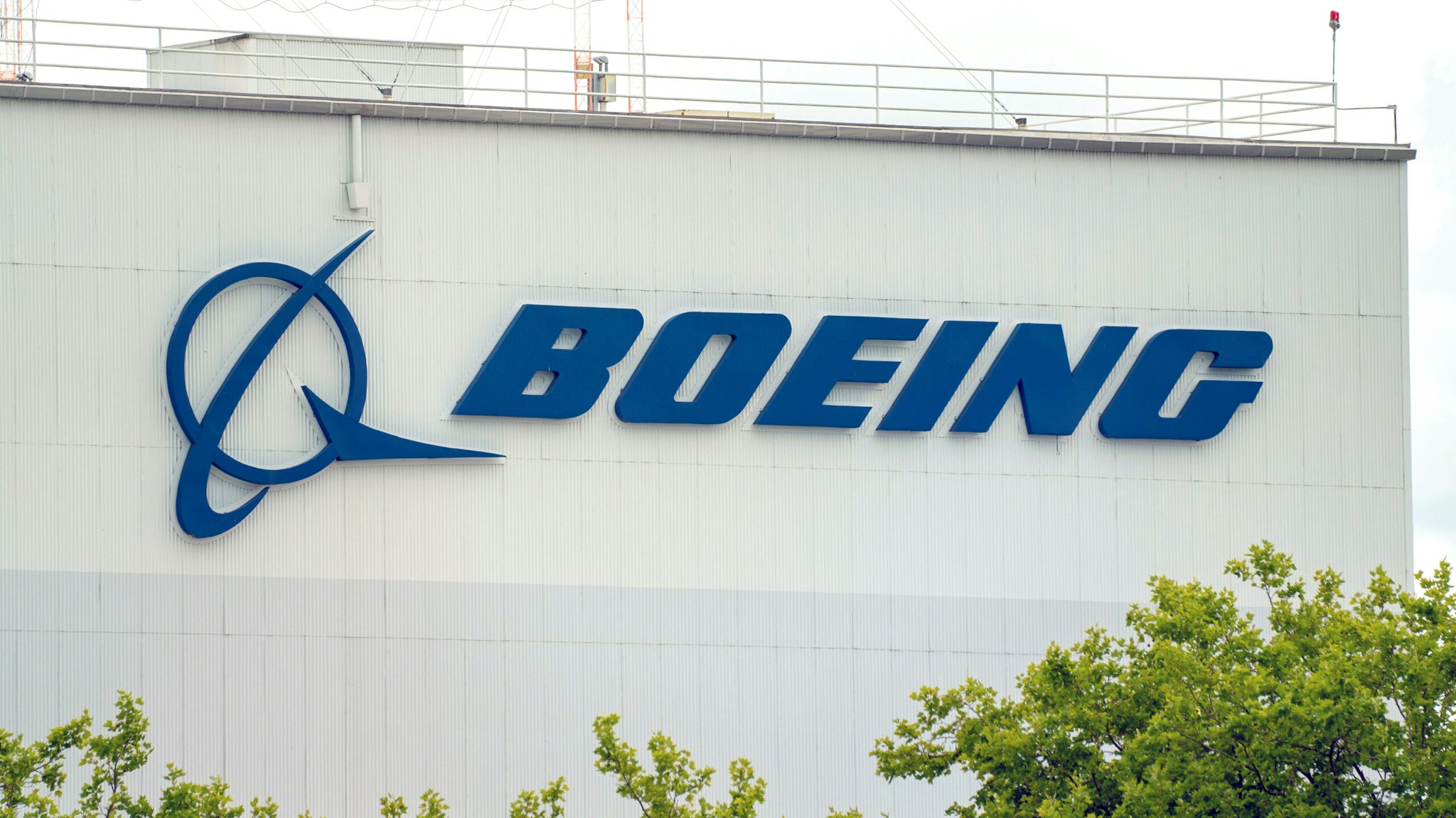 The Boeing logo on a building at Boeing Field in Seattle, Washington, US, on Tuesday, July 25, 2023. Boeing Co. is scheduled to release earnings figures on July 26.