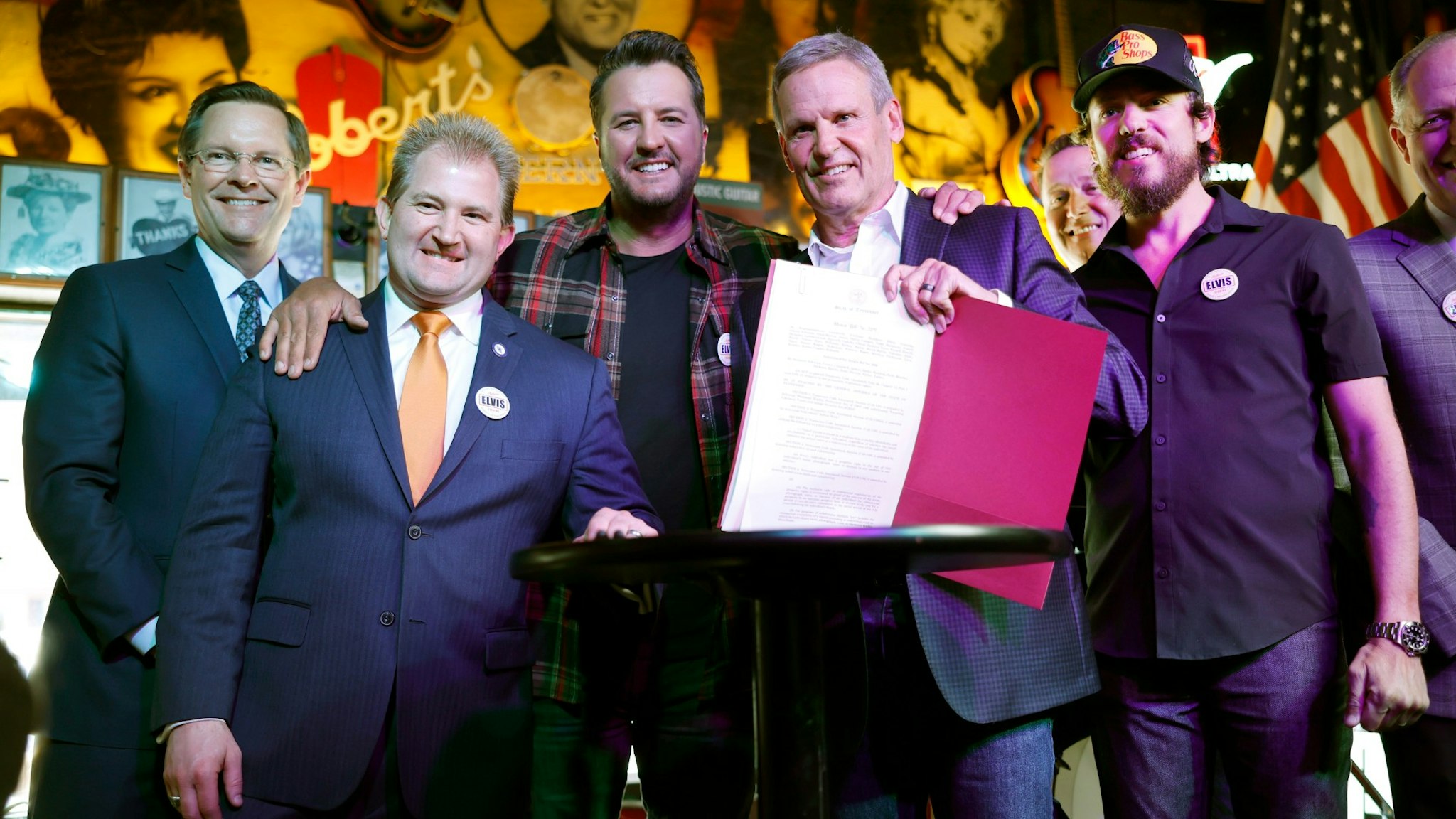 Speaker of the Tennessee House of Representatives Cameron Sexton, Representative William Lamberth, Luke Bryan, Governor Bill Lee, Mitch Glazier, Chris Janson and Senator Jack Johnson are seen at the signing of the ELVIS Act to Protect Voice & Likeness in Age of AI at Robert’s Western World on March 21, 2024 in Nashville, Tennessee.