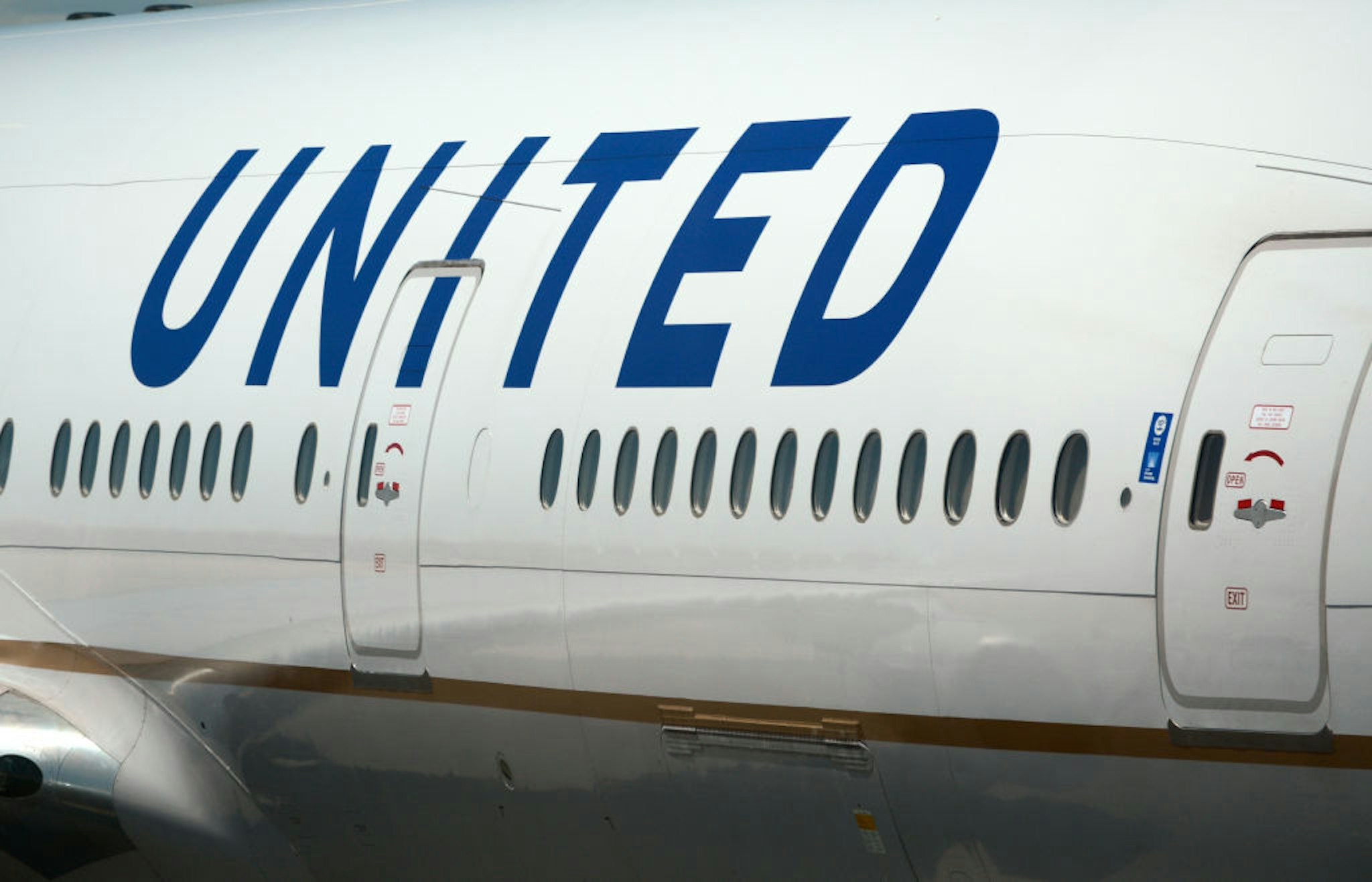 DENVER, COLORADO - JUNE 20, 2019: A United Airlines Boeing 777 passenger aircraft at Denver International Airport in Denver, Colorado.