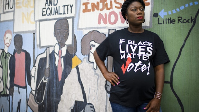 NASHVILLE, Tenn. - MAY 11, 2019: Charlane Oliver, co-founder of Equity Alliance, poses for a portrait on historic Jefferson Street. Equity Alliance is a partner in the Tennessee Black Voter Project and has helped register about 90,000 Tennessee voters. Now Tennessee has passed a law criminalizing the submission of incomplete voter registration forms. "This law is designed to intimidate people who do voter registration and stifle efforts to vote in communities of color," Oliver said.
