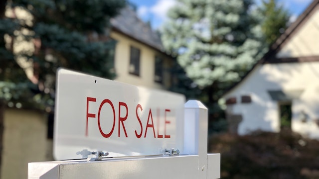 SondraP. Getty Images. Real estate for sale sign in residential neighborhood, New Jersey, USA.