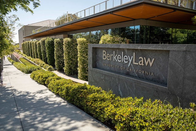 Signage for the Berkeley School of Law on the University of California, Berkeley campus in Berkeley, California, U.S., on Friday, June 4, 2021. The University of California has shared details on a proposed Covid-19 vaccination policy that would require students, faculty, academic appointees, and staff who are accessing campus facilities at any UC location beginning this fall to be immunized against SARS-CoV-2. Photographer: David Paul Morris/Bloomberg via Getty Images