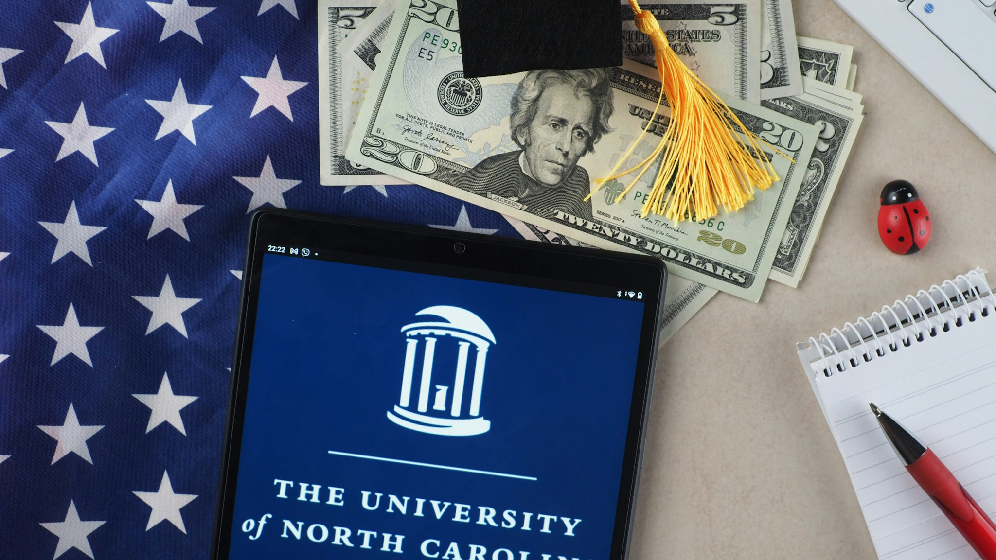In this photo illustration, the University of North Carolina, Chapel Hill logo seen displayed on a tablet.