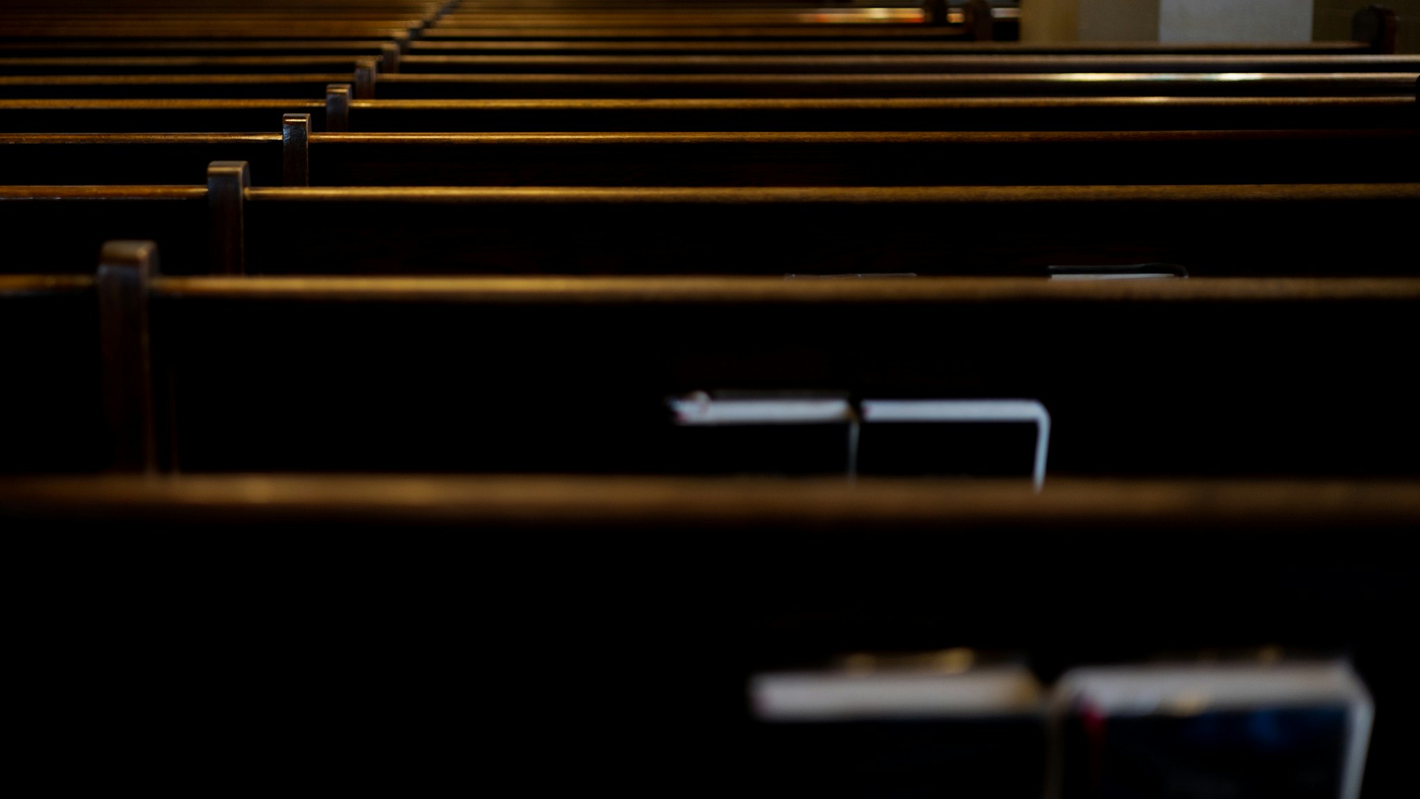 back of wooden pews ~ shot with canon eos rp.