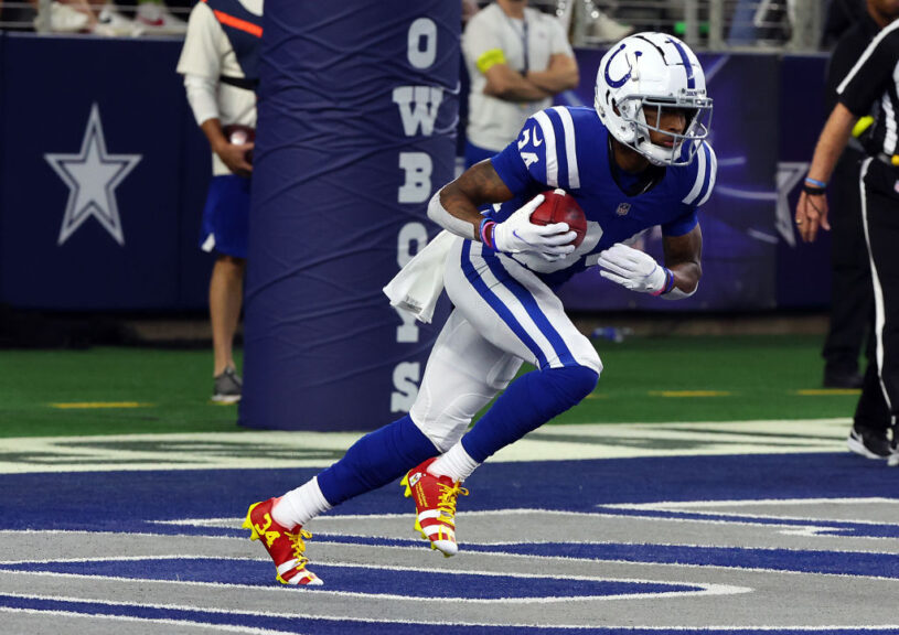 ARLINGTON, TEXAS - DECEMBER 04: Isaiah Rodgers #34 of the Indianapolis Colts runs the ball on a kickoff return against the Dallas Cowboys at AT&T Stadium on December 04, 2022 in Arlington, Texas. (Photo by Richard Rodriguez/Getty Images)
