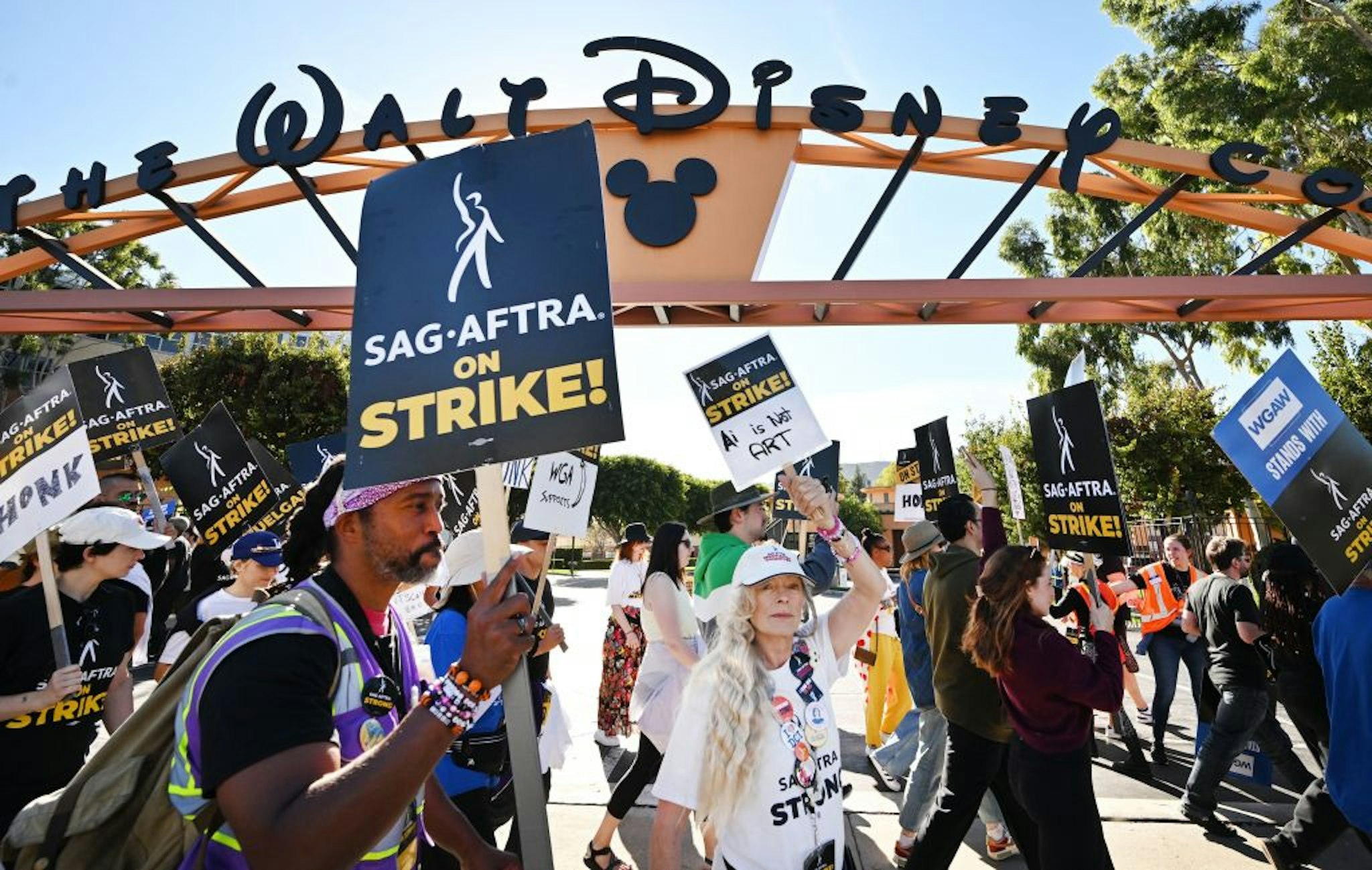 EDITORS NOTE: Graphic content / TOPSHOT - Actress Frances Fisher along SAG-AFTRA members and supporters pickets outside Disney Studios on day 111 of their strike against the Hollywood studios, in Burbank, California, on November 1, 2023. SAG-AFTRA members walked off film and TV sets in July, over terms including pay and the use of artificial intelligence. Talks have intensified in recent weeks, with the two sides meeting most days and expressing cautious optimism -- while also warning that they remain far apart on several key issues. (Photo by Frederic J. BROWN / AFP) (Photo by FREDERIC J. BROWN/AFP via Getty Images)