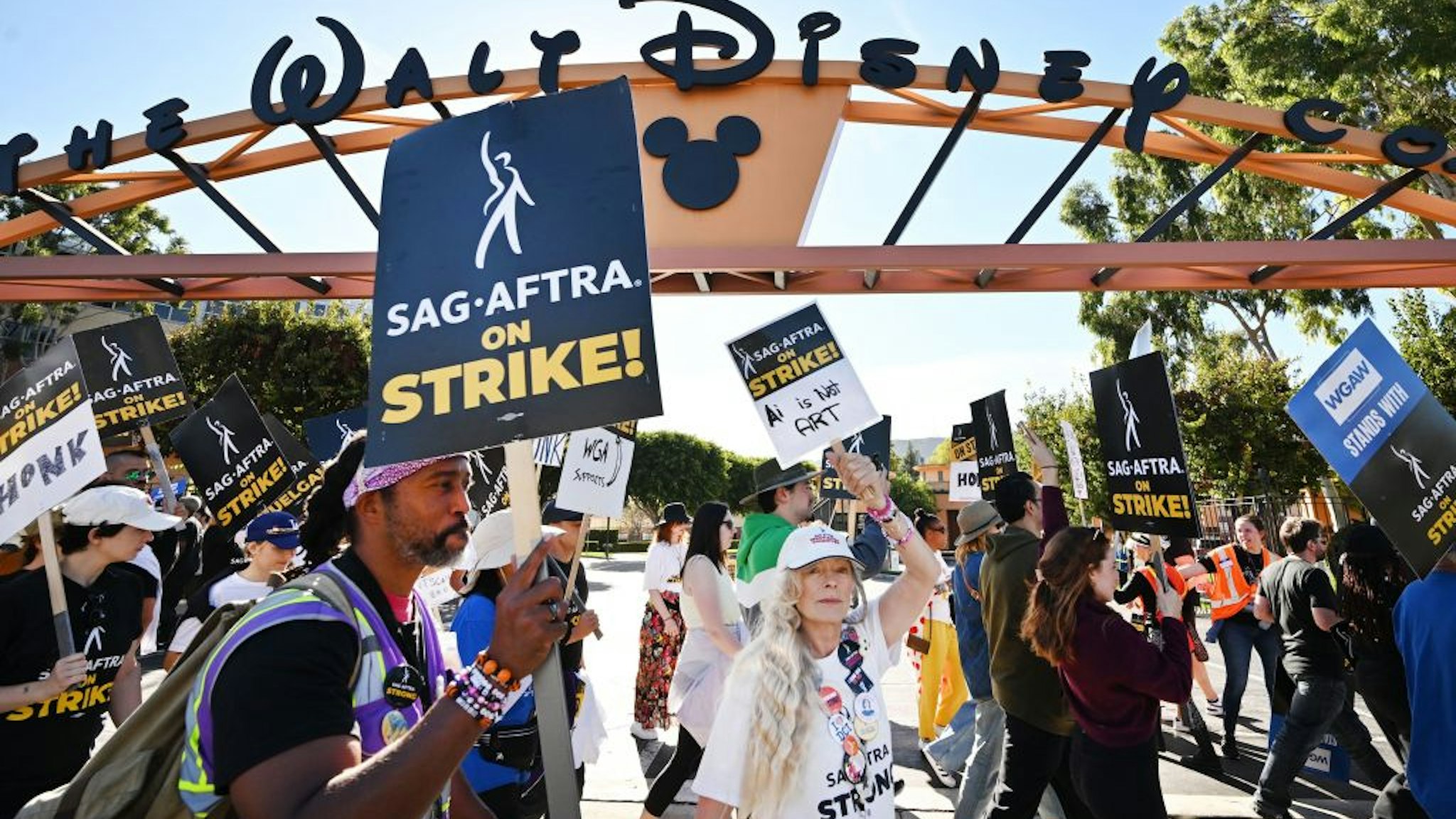 EDITORS NOTE: Graphic content / TOPSHOT - Actress Frances Fisher along SAG-AFTRA members and supporters pickets outside Disney Studios on day 111 of their strike against the Hollywood studios, in Burbank, California, on November 1, 2023. SAG-AFTRA members walked off film and TV sets in July, over terms including pay and the use of artificial intelligence. Talks have intensified in recent weeks, with the two sides meeting most days and expressing cautious optimism -- while also warning that they remain far apart on several key issues. (Photo by Frederic J. BROWN / AFP) (Photo by FREDERIC J. BROWN/AFP via Getty Images)