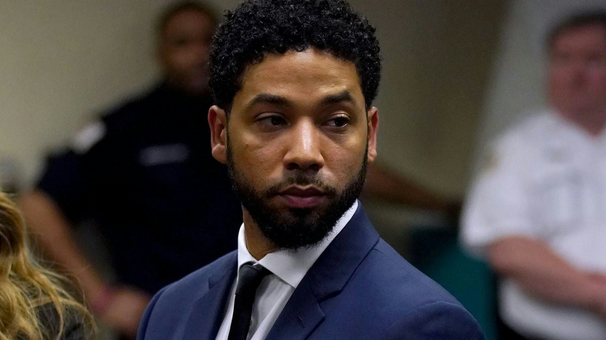 TV actor Jussie Smollett stands before Cook County Circuit Judge Steven Watkins on March 14, 2019, at the Leighton Criminal Court Building in Chicago, where he pled not guilty.