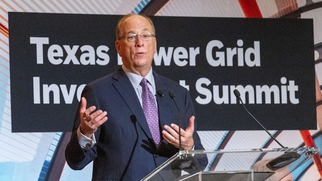 Lieutenant Governor Dan Patrick, right, listens as Larry Fink, Chairman and Chief Executive Officer of BlackRock, makes a statement during opening remarks of the Texas Power Grid Investment Summit, Tuesday, Feb. 6, 2024 in Houston.