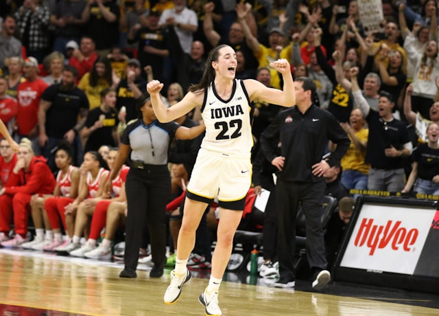 Guard Caitlin Clark #22 of the Iowa Hawkeyes celebrates after breaking Pete Maravich's all-time NCAA scoring record during the first half against the Ohio State Buckeyes at Carver-Hawkeye Arena on March 3, 2024 in Iowa City, Iowa.