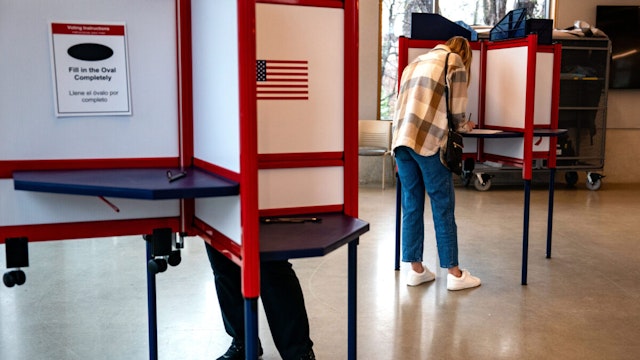 ARLINGTON, VIRGINIA - MARCH 5: Voters cast their ballots at a polling location at the Lubber Run Community Center on March, 5 2024 in Arlington, Virginia. 15 States and one U.S. Territory hold their primary elections on Super Tuesday, awarding more delegates than any other day in the presidential nominating calendar.