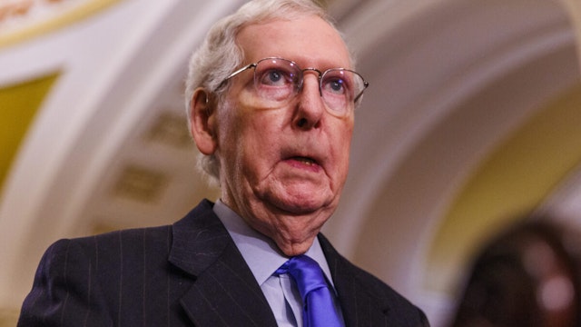 Senate Republican Leader Mitch McConnell prepares to speak to the media during a weekly press conference in the Capitol Building in Washington DC on Tuesday, March 12, 2024.