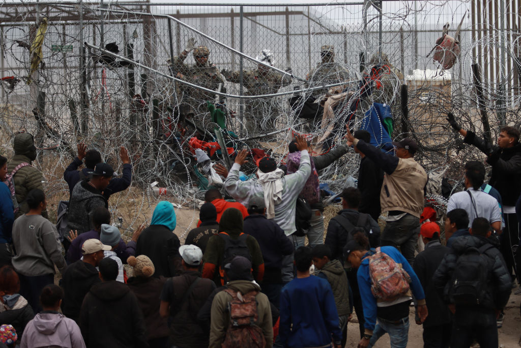 Border Patrol processes and releases illegal immigrants who rushed National Guard into the United States