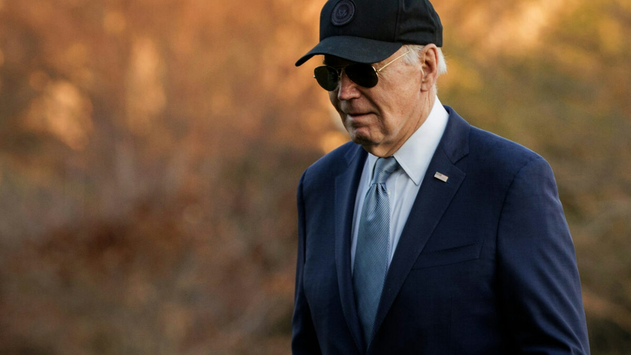US President Joe Biden walks on the South Lawn of the White House after arriving on Marine One in Washington, DC, US, on Thursday, March 21, 2024. A lawsuit filed against President Joe Biden and the US Department of Energy in Louisiana federal court on Thursday asks a judge to overturn the temporary pause of new licenses to export natural gas via ocean-going tankers.