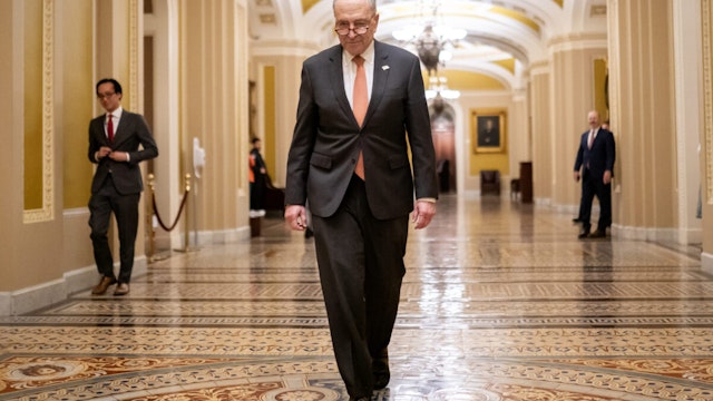 WASHINGTON, DC - MARCH 23: U.S. Senate Majority Leader Charles Schumer (D-NY) departs the Senate Chambers on March 23, 2024 in Washington, DC. The House of Representatives passed a $1.2 trillion spending bill to fund the government through September and avert a partial shutdown. The legislation will now go to the Senate for consideration.