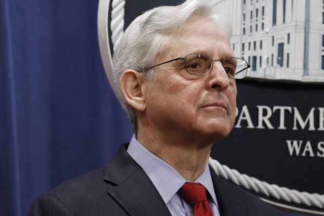 U.S. Attorney General Merrick Garland listens as Deputy Attorney General Lisa Monaco speaks during a news conference at the Department of Justice Building on March 21, 2024 in Washington, DC.