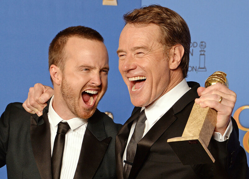 Actors Aaron Paul (L) and Bryan Cranston (R), pose in the press room after Cranston won Best Actor in a TV drama and "Breaking Bad" won Best Series - Drama, at the 71st Annual Golden Globe Awards in Beverly Hills, California, January 12, 2014. AFP PHOTO / ROBYN BECK (Photo credit should read ROBYN BECK/AFP via Getty Images)