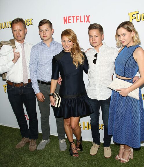 LOS ANGELES, CA - FEBRUARY 16: Valeri Bure, Lev Valerievich Bure, actress Candace Cameron-Bure, Maksim Valerievich Bure, and Natasha Valerievna Bure attend the premiere of Netflix's 'Fuller House' on February 16, 2016 in Los Angeles, California. (Photo by JB Lacroix/WireImage)